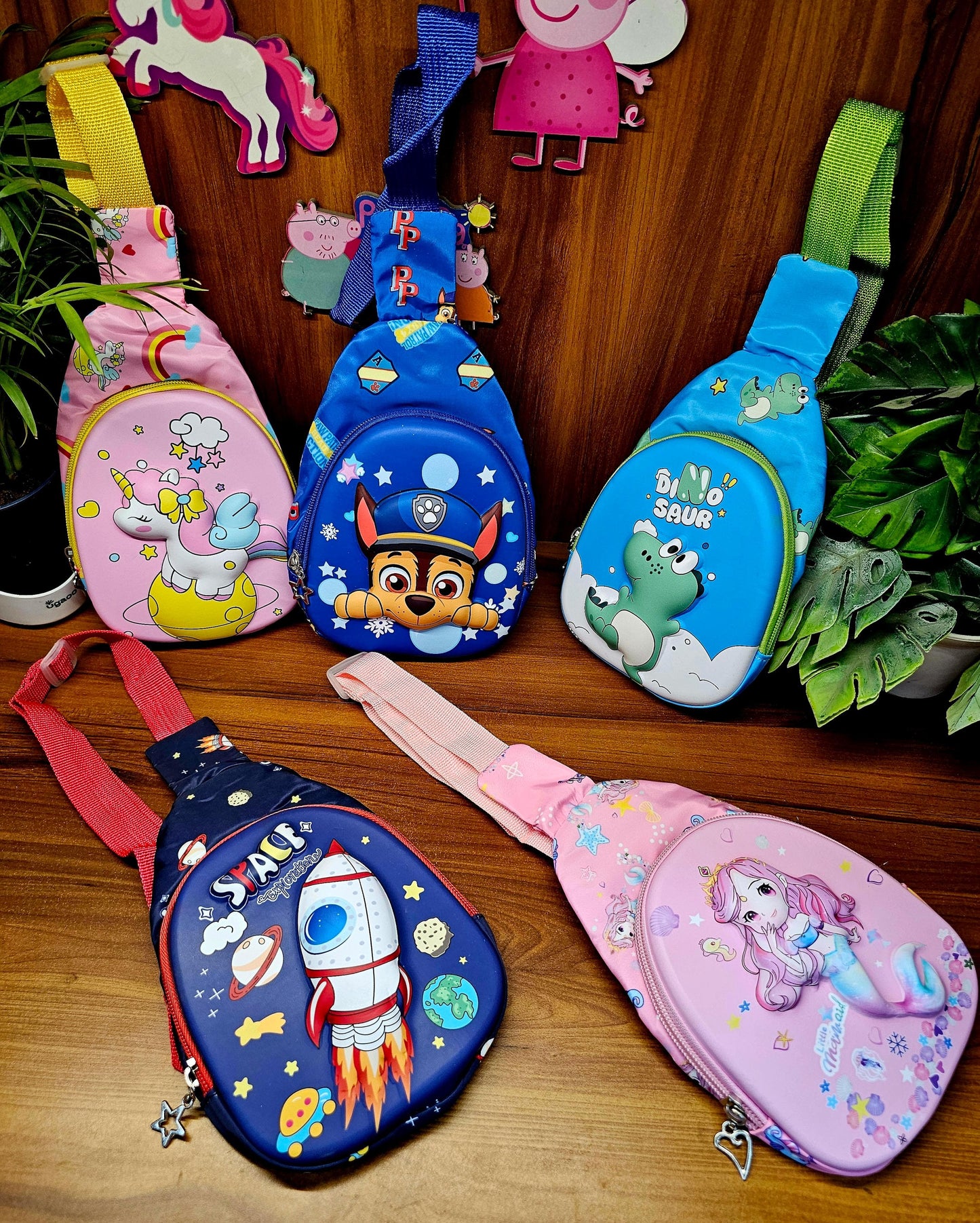 Colorful 3D toddler chest bags with playful designs for back to school, featuring unicorns and rockets