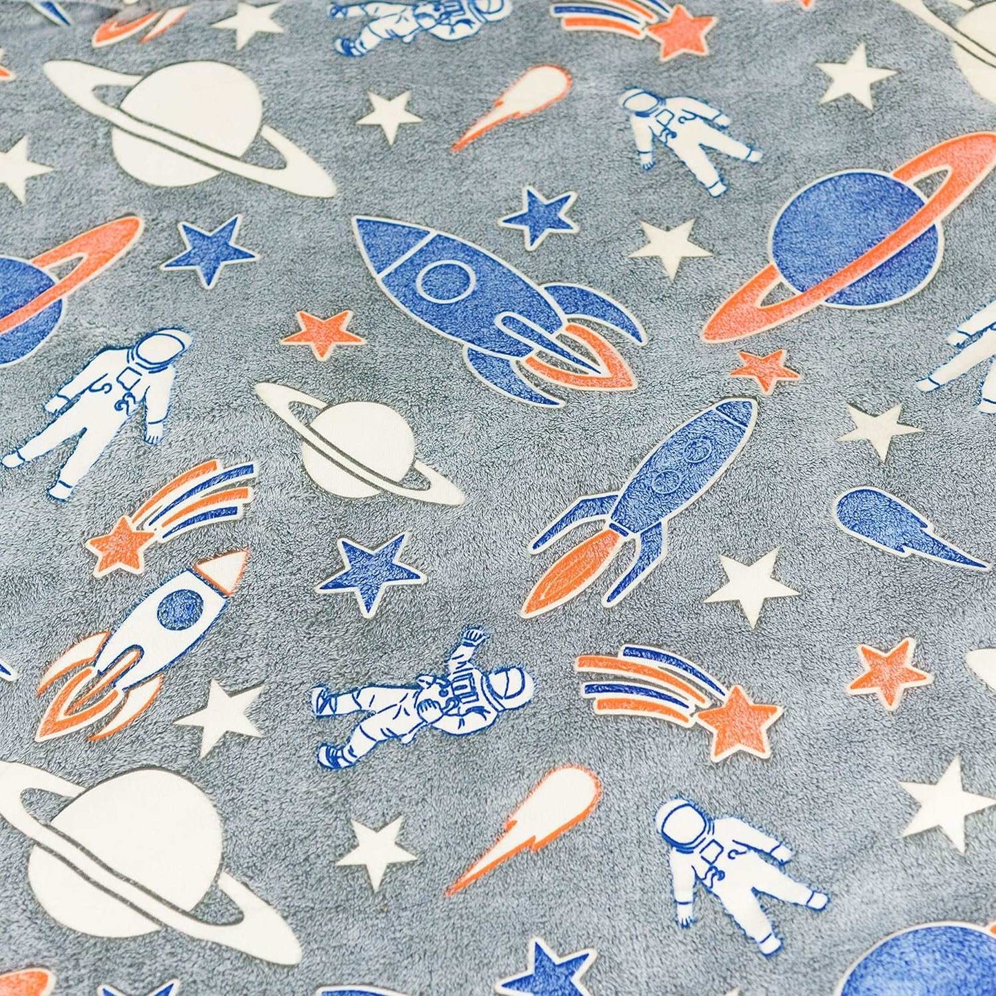 Gray fabric with colorful space-themed pattern featuring astronauts rockets planets and stars