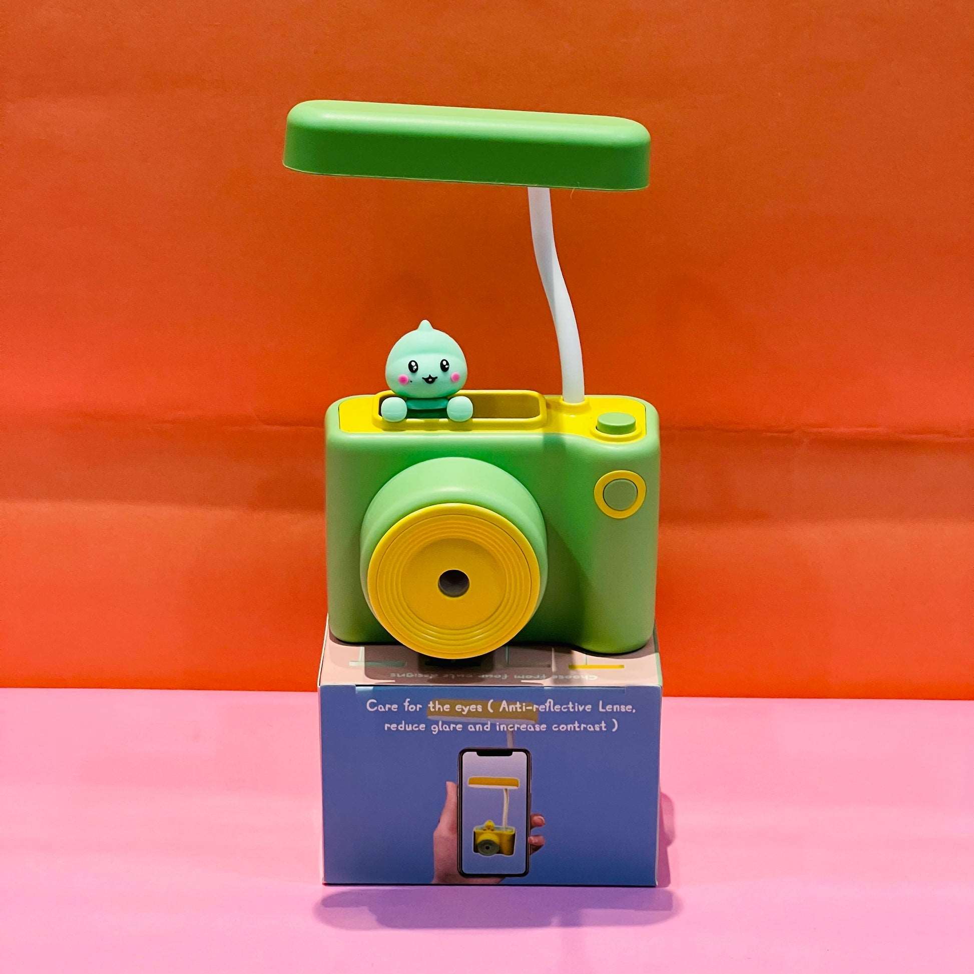 NIYO TOYS camera shaped table lamps in green with adjustable brightness and cute character on top