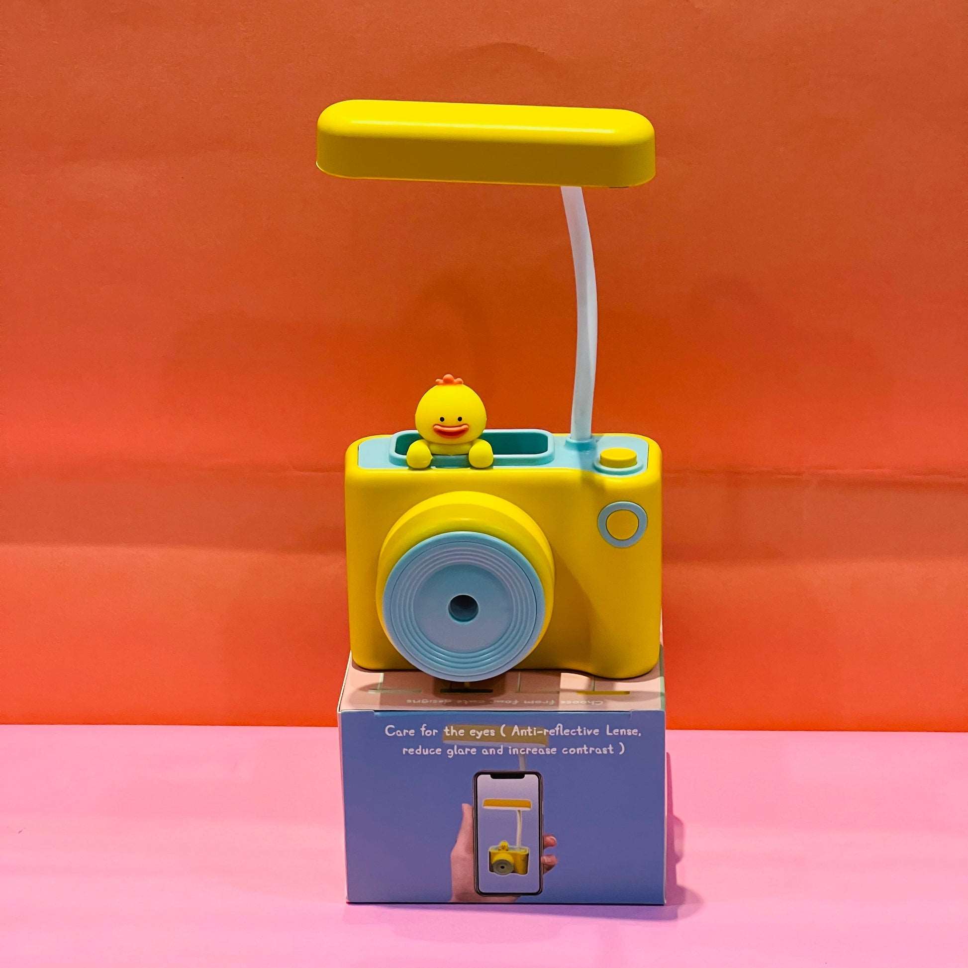NIYO TOYS camera shaped table lamps in yellow with a cute design and adjustable light