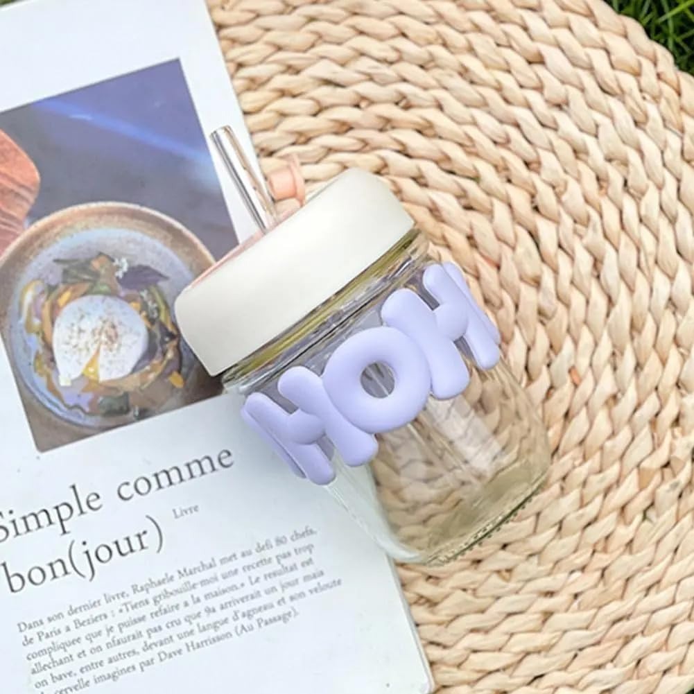 Cute glass tumbler with lid and straw for kids, featuring a playful design and ideal for age 3+ summer drinks