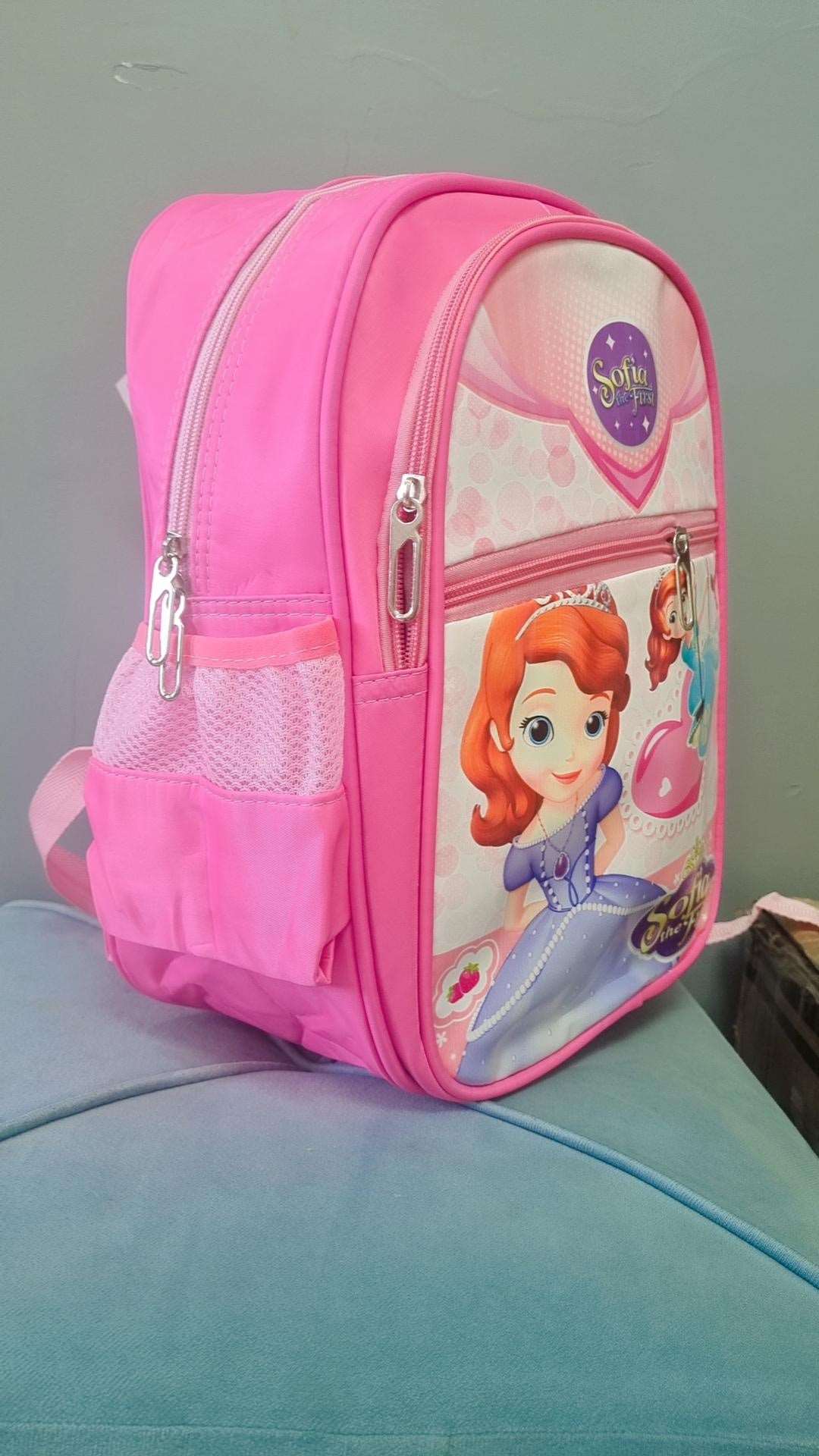 Pink Disney backpack for kids featuring Sofia the First with spacious compartments and mesh pockets