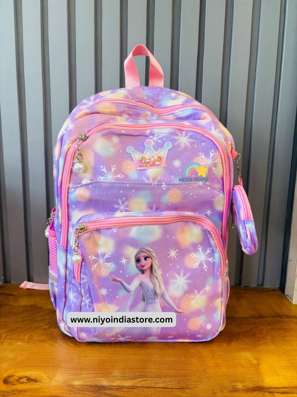 Frozen school backpack featuring Elsa design with vibrant colors and multiple compartments