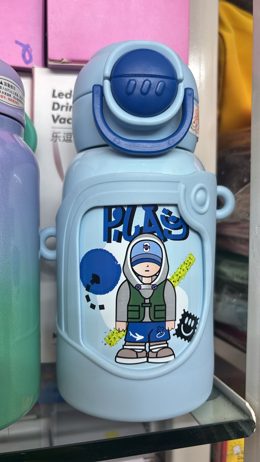 Light blue stainless steel drinks bottle with cartoon design, suitable for kids ages 3 and up