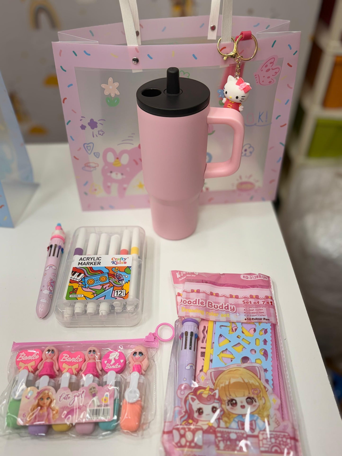 Hello Kitty pink hamper with colorful art supplies, age 3+, perfect for kids' organization and play