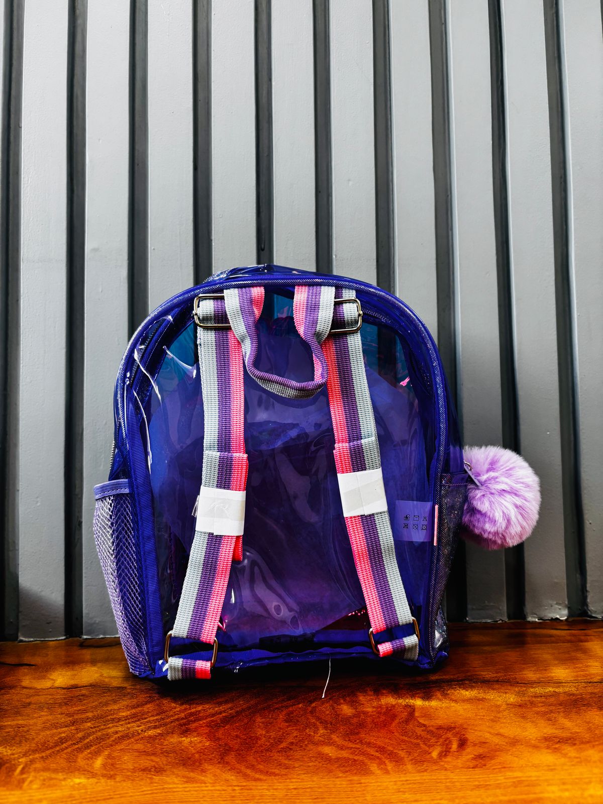 NIYO TOYS holographic unicorn bag for kids with vibrant colors and fluffy pom-pom detail