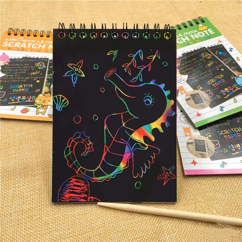 NIYO TOYS colorful sea horse scratch art notebook return gift with wooden stylus on burlap background