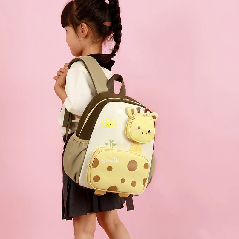 Cute NIYO TOYS kids backpack in cream and brown with a giraffe design, ideal for school and playful adventures