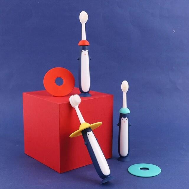 NIYO TOYS Penguin-Themed Toothbrushes in Blue, Red, and Aqua for Fun and Engaging Oral Care