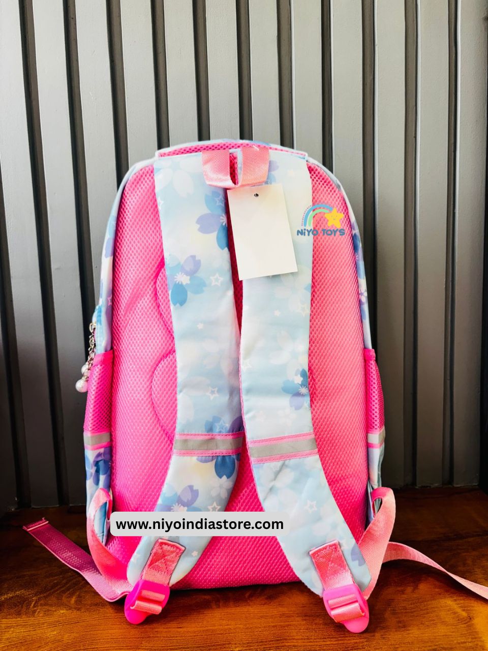 Kuromi school backpack in pink with floral design and adjustable padded straps