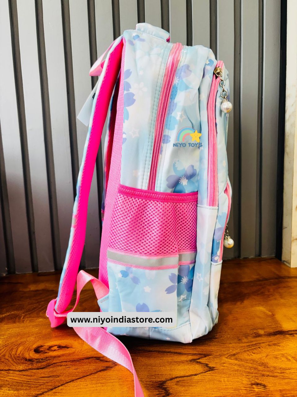 NIYO TOYS Kuromi school backpack in blue with floral design and pink accents for stylish students