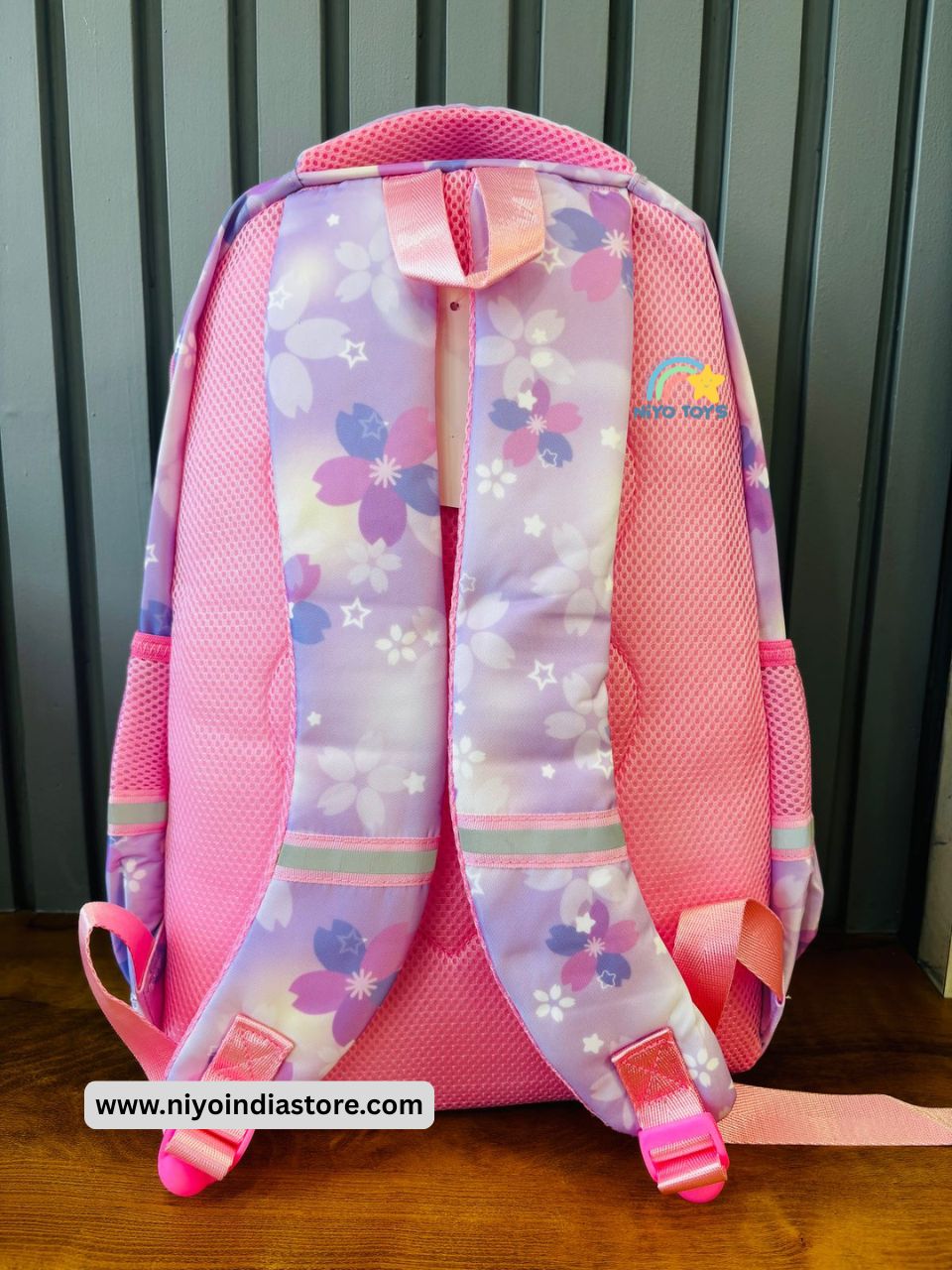 Kuromi school backpack in pink with floral design and padded straps for comfort and style