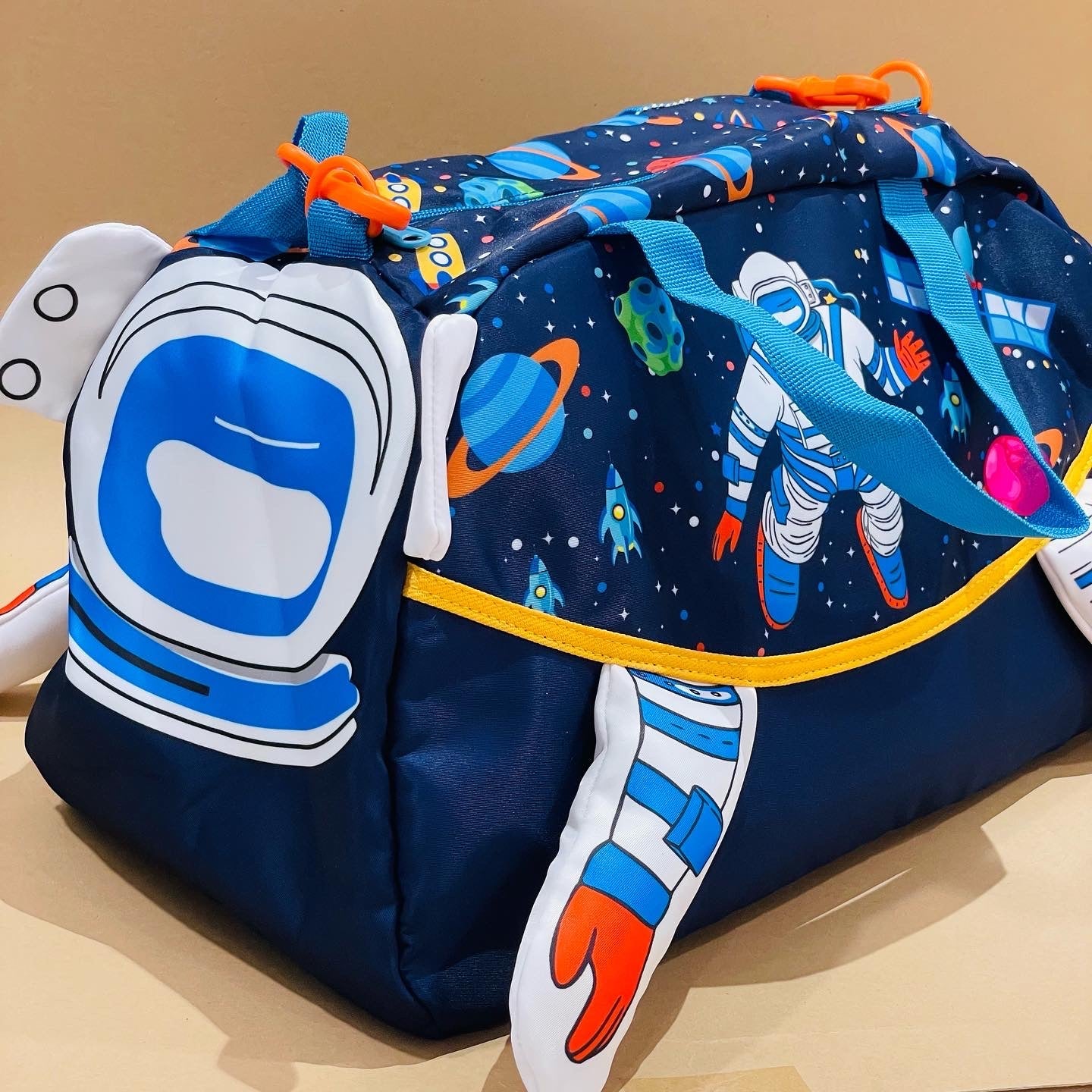 NIYO TOYS large unicorn duffle bag with colorful astronaut design and vibrant details