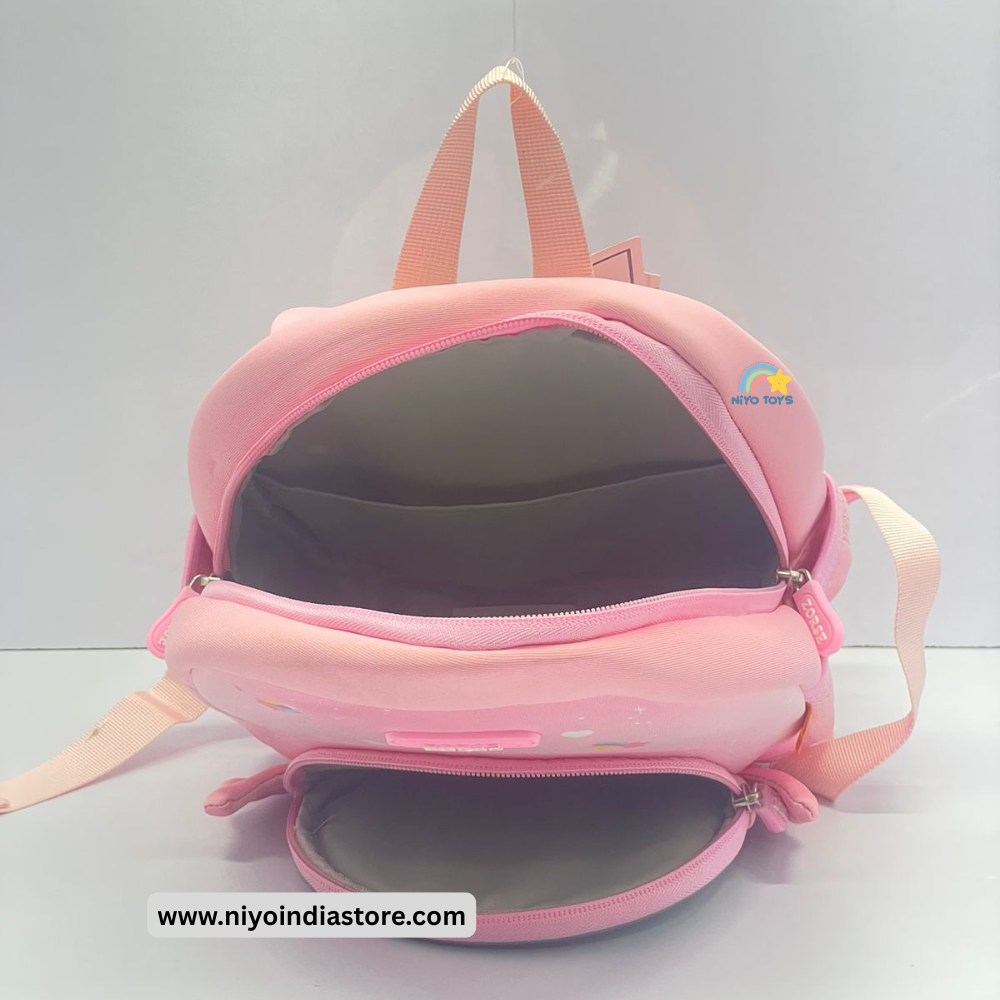 Inside view of a pink 3D unicorn backpack for kids featuring spacious compartments and adorable design