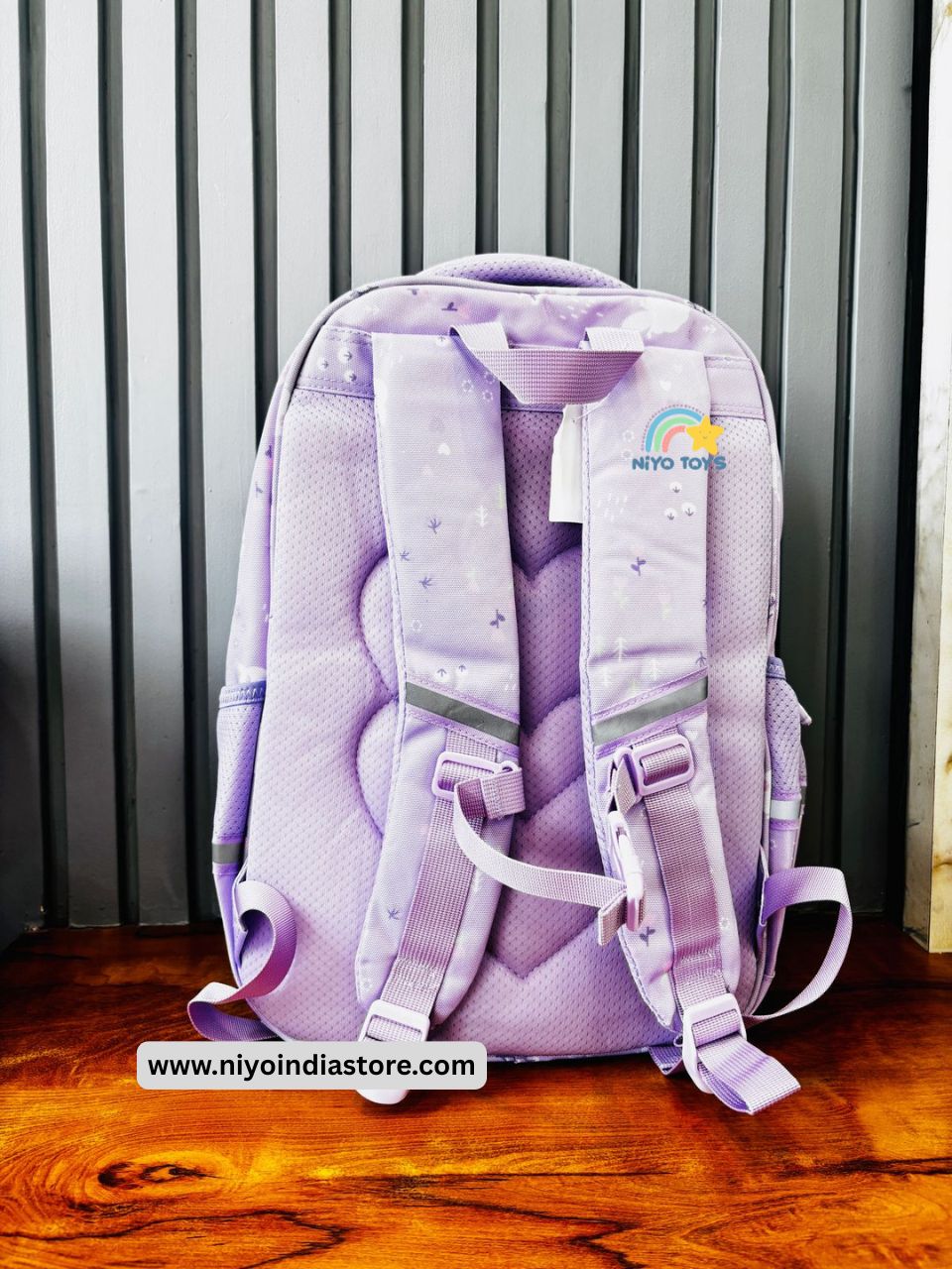 NIYO TOYS premium girls school backpack in purple with padded straps and star pattern