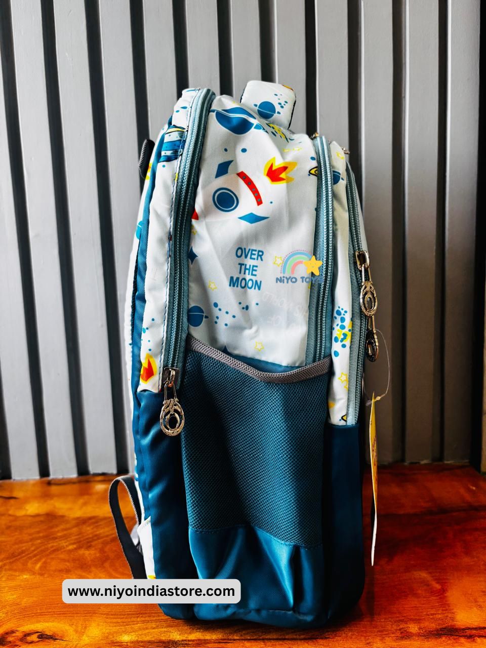 NIYO TOYS Space Design Backpack for School with colorful space graphics and durable material