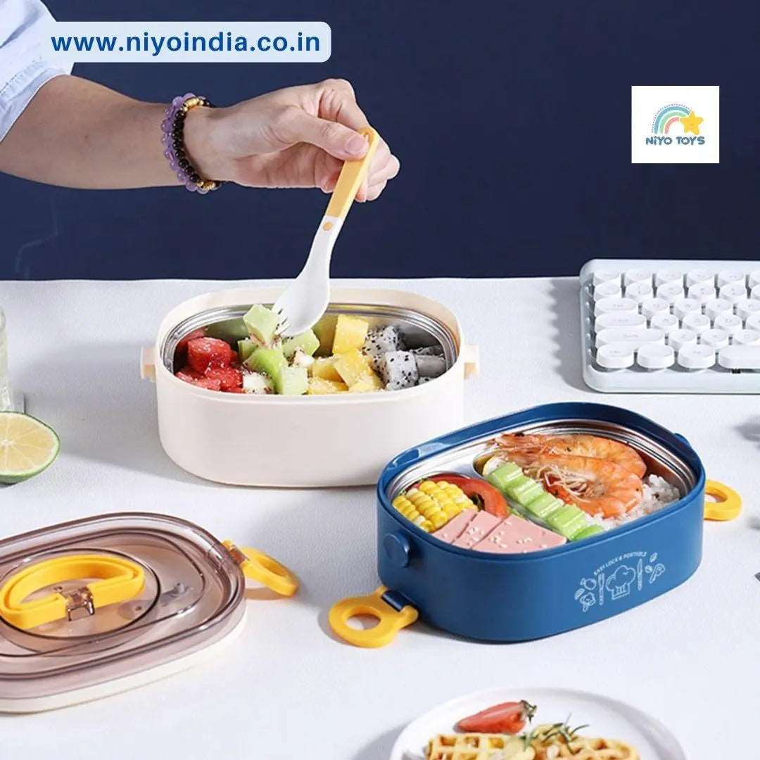 Stainless steel lunch box for kids with divided sections and colorful fruits and vegetables
