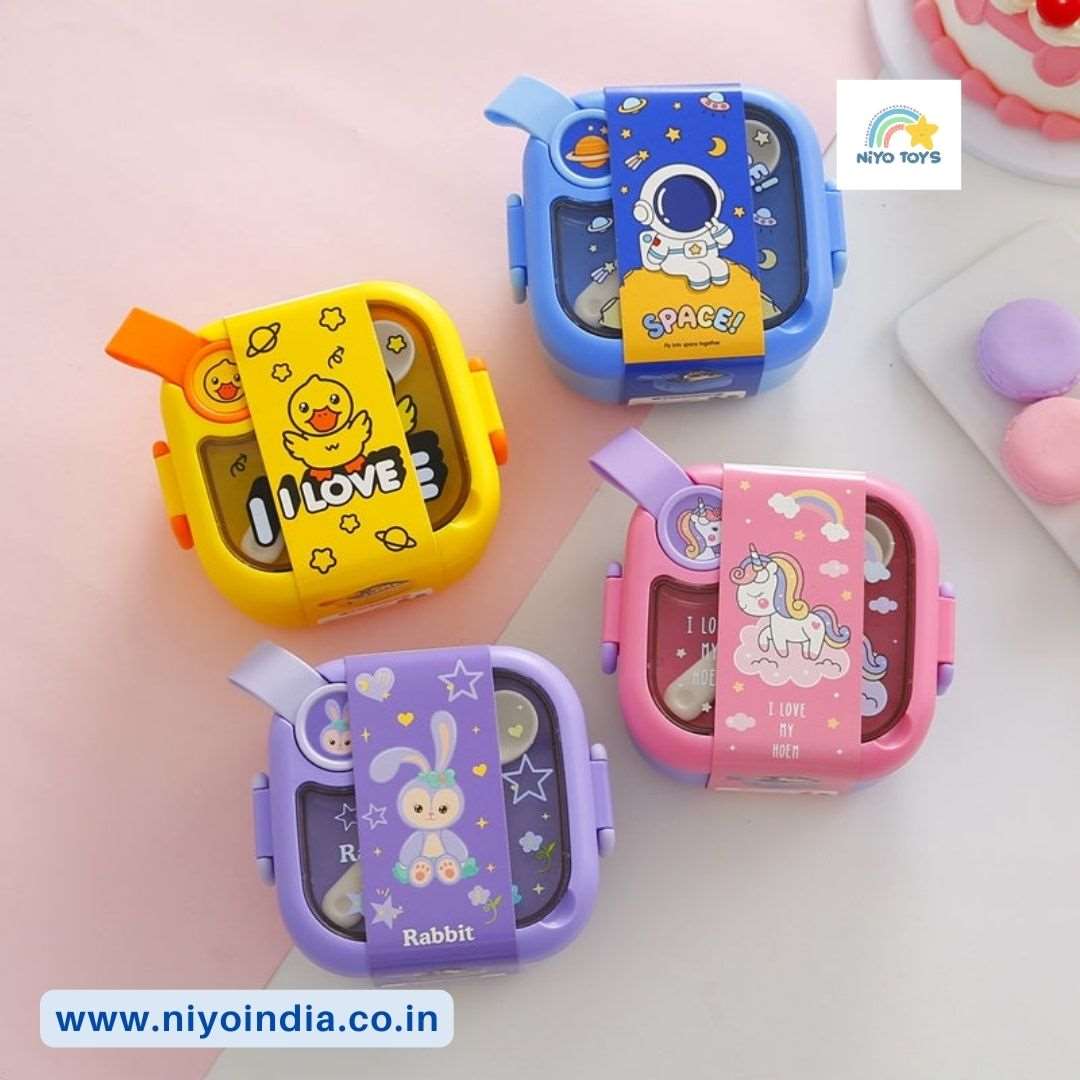 Colorful Teeny Tiny lunch box for kids featuring fun designs like rabbit and space theme