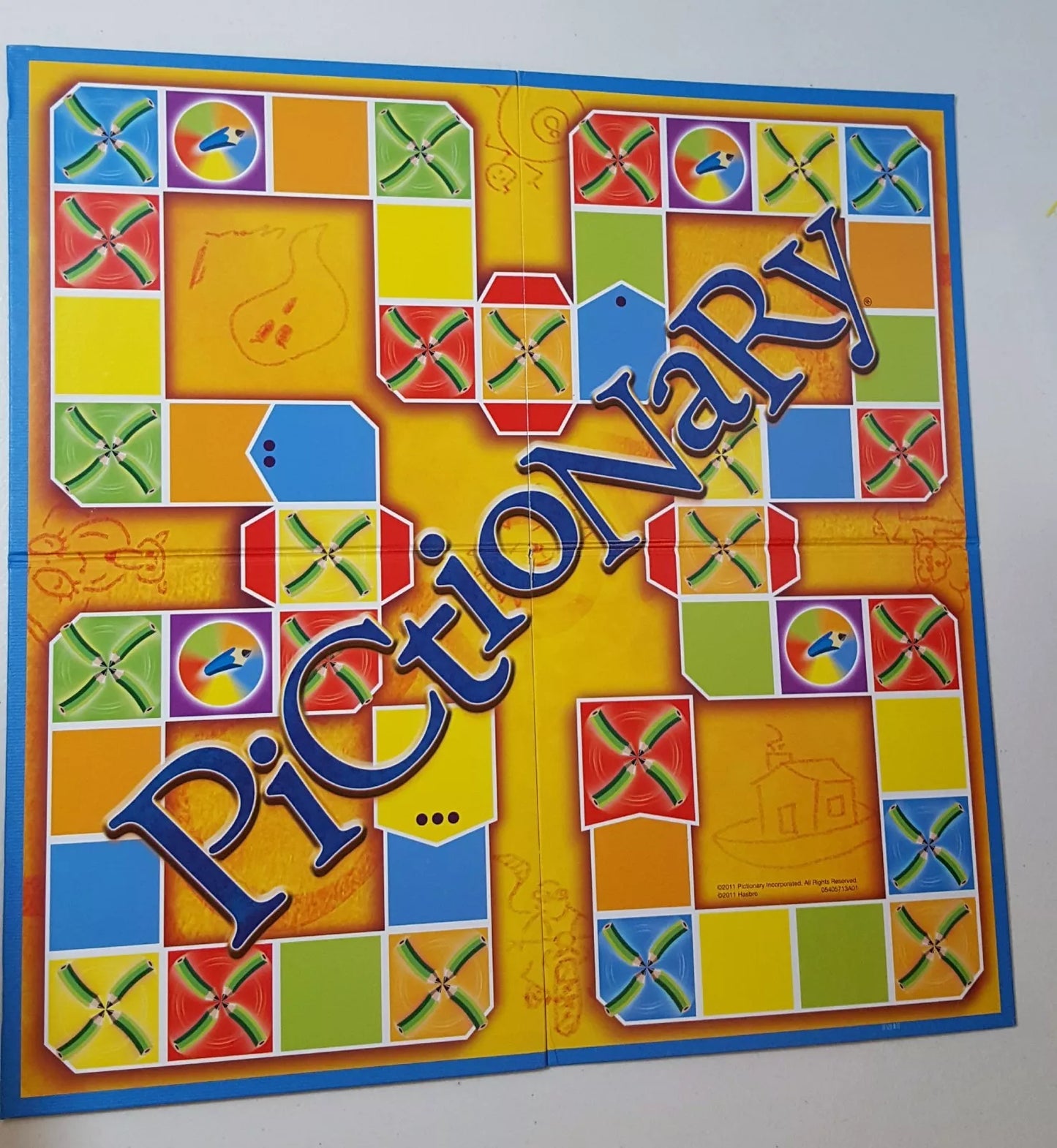 Pictionary game for kids featuring colorful board design with vibrant drawings and playful layout