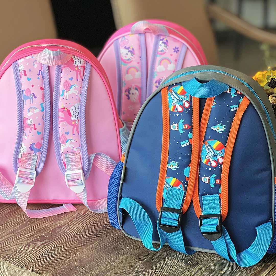 Colorful toddler backpack with pouches featuring unicorn and space designs, ideal for preschoolers