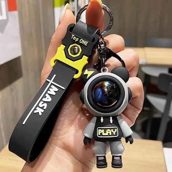 NIYO TOYS return gift astronaut keychain with black mask strap and Play text detail