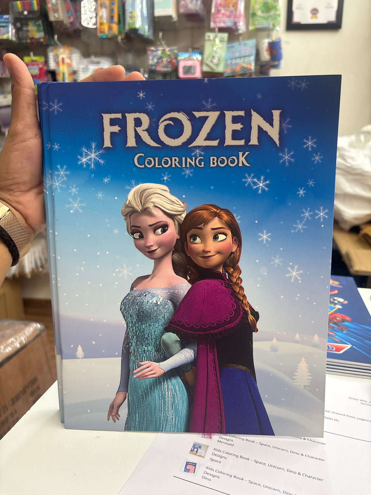 Frozen coloring book featuring Elsa and Anna, perfect for kids who love enchanting stories