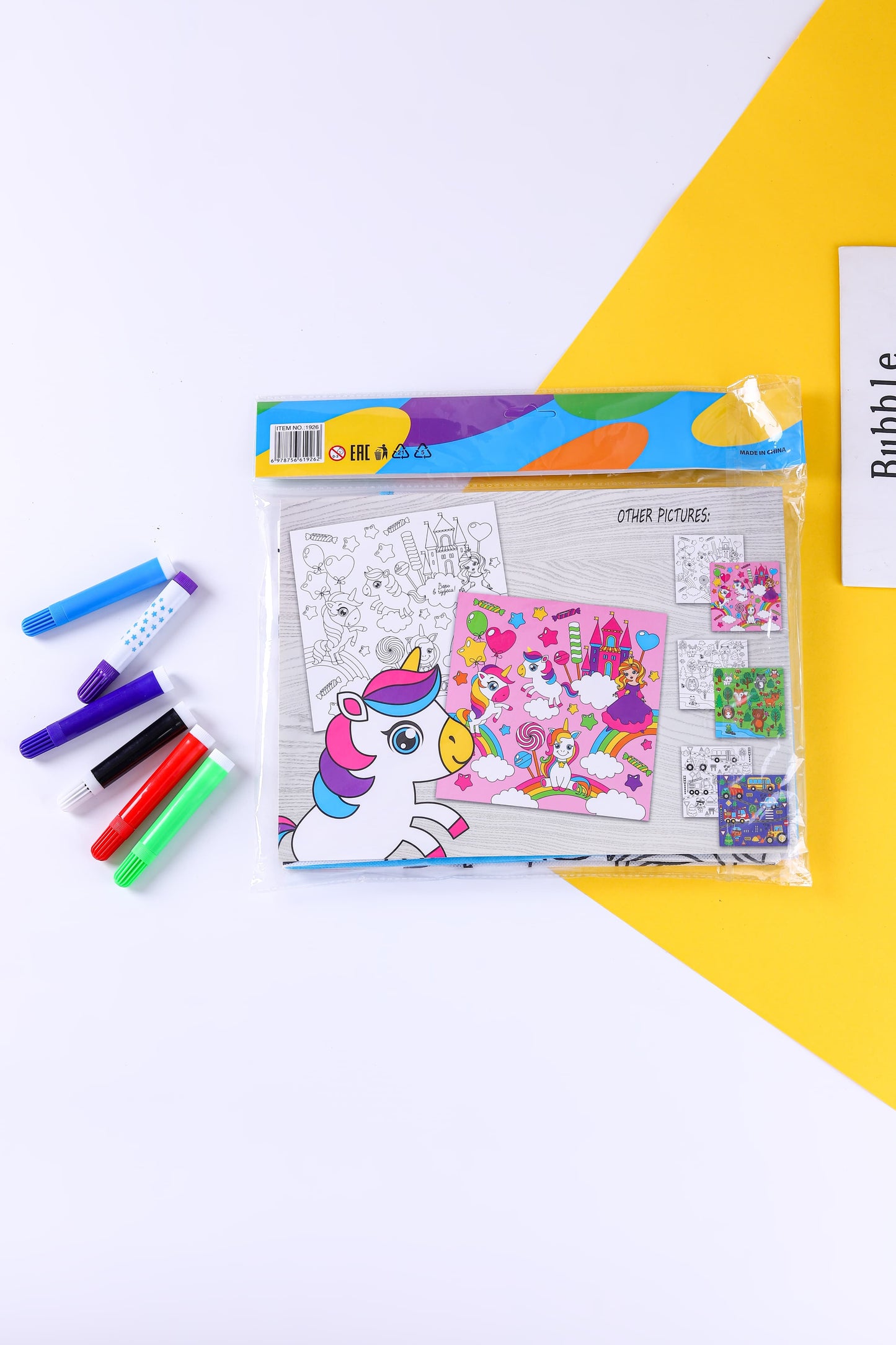 NIYO TOYS washable coloring mat for kids with various coloring markers and playful designs