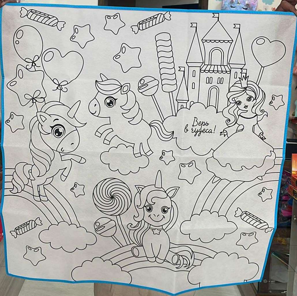 Colorful NIYO TOYS washable coloring mat for kids featuring unicorns, sweets, and a castle design