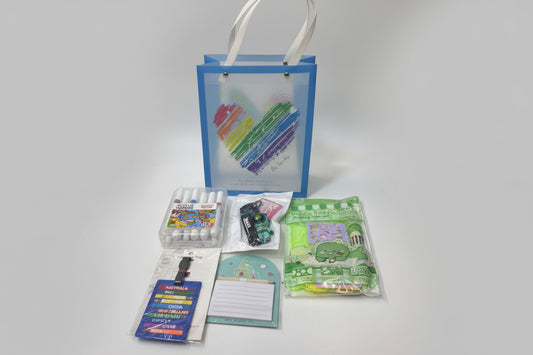 Colorful hamper with acrylic markers, activity set, and accessories for creative fun, suitable for ages 5 and up