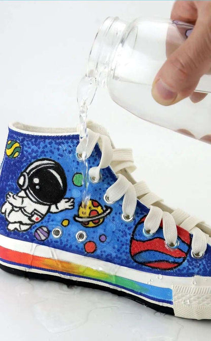 NIYO TOYS acrylic paint pens for crafts on a decorated sneaker featuring an astronaut theme, suitable for ages 5+