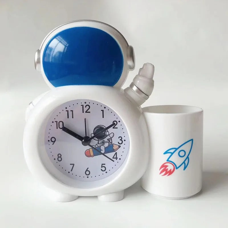 Astronaut-themed alarm clock with blue details, suitable for ages 3+, perfect for encouraging morning routines
