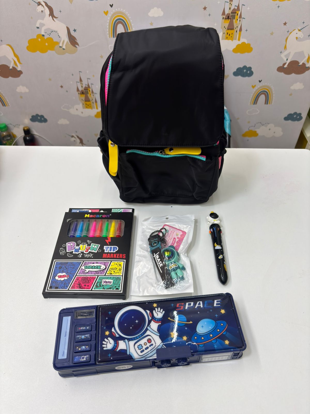 Black NIYO TOYS hamper for kids, featuring space design, ideal for organizing toys and art supplies