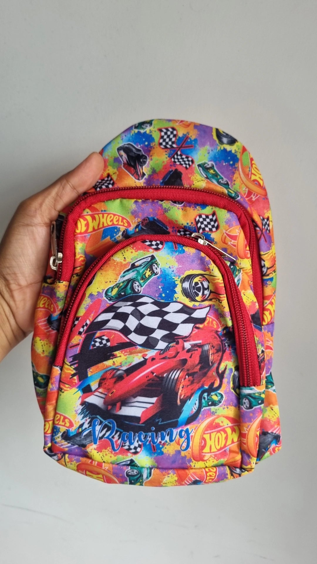 Colorful racing car backpack, bag with sling, suitable for kids ages 3 and up, perfect for school or play