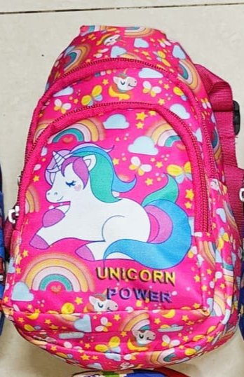 Pink unicorn bag with sling for kids featuring colorful designs, ideal for ages 3 and up