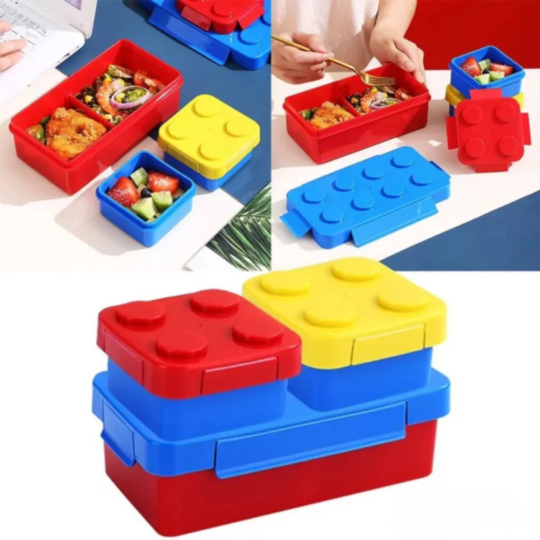 Building blocks lunch box for kids in red and blue with a yellow top, perfect for age 3 and up