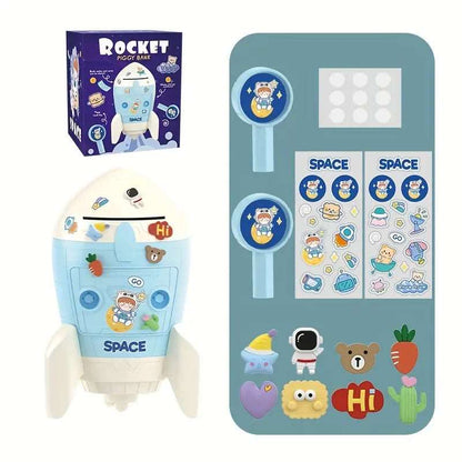NIYO TOYS cardboard spaceship DIY piggy bank in blue with stickers, fun saving tool for kids age 4+