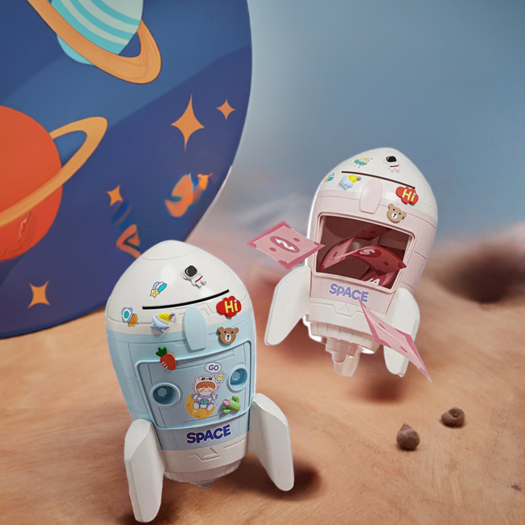 Cardboard spaceship DIY piggy bank in blue and pink for kids, encouraging saving and creativity
