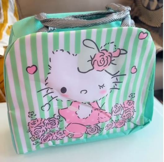 Hello Kitty themed children's insulated lunch bag with green stripes and floral design