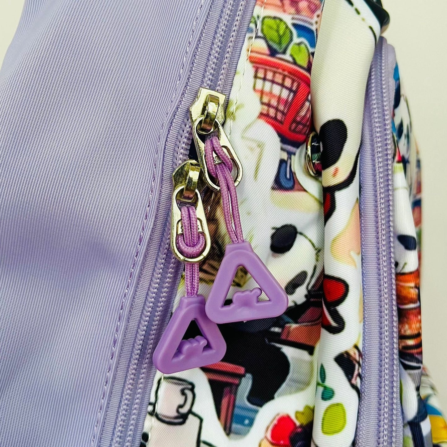 Purple NIYO TOYS panda backpack with fun design, ideal for kids age 3 and up for school or play.
