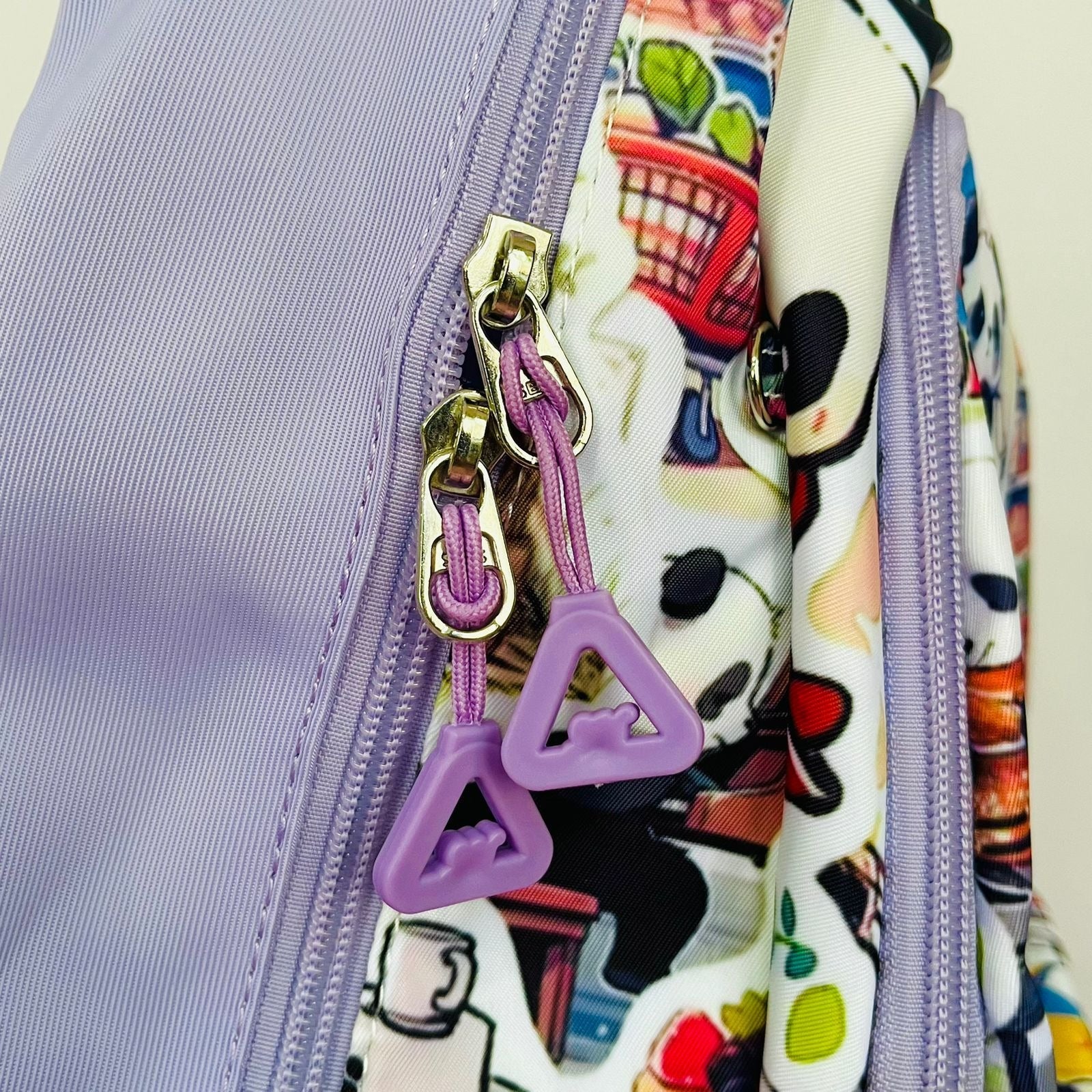 Purple NIYO TOYS panda backpack with fun design, ideal for kids age 3 and up for school or play.
