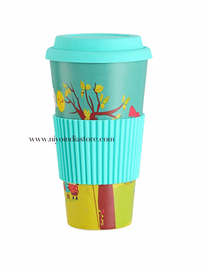 NIYO TOYS colorful coffee mug with a tree design and teal silicone sleeve, perfect for kids age 3+