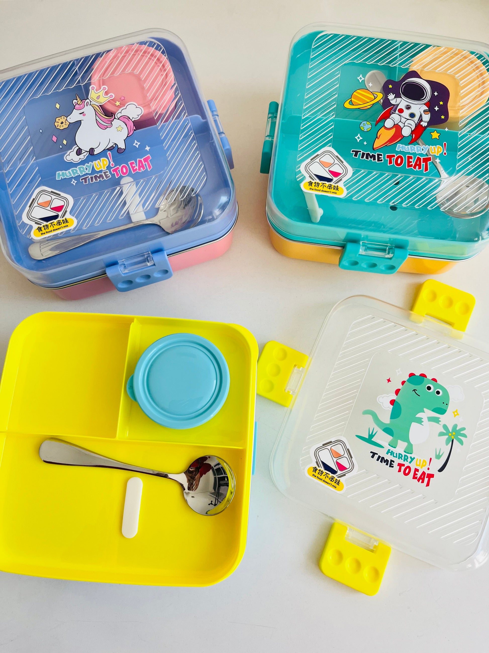 Brightly colored NIYO TOYS compartment lunchbox for kids with fun designs and included spoon