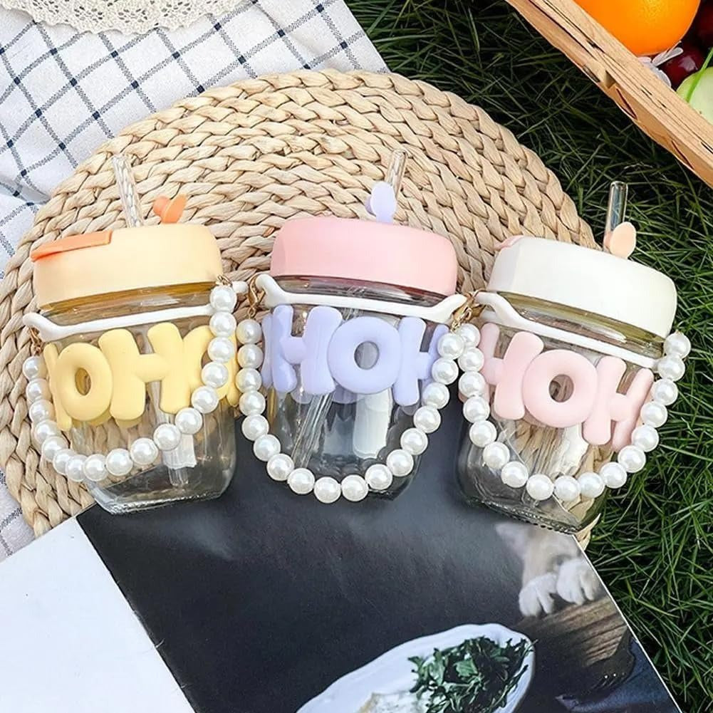 Cute glass tumbler with lid and straw in pastel colors for kids, perfect for parties and outdoor use