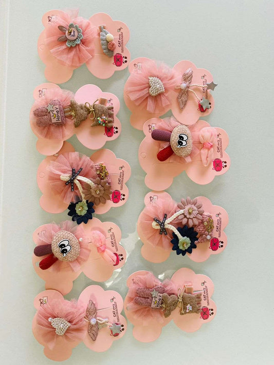 Set of NIYO TOYS cute hairbow hairpins featuring colorful designs and embellishments on a display card