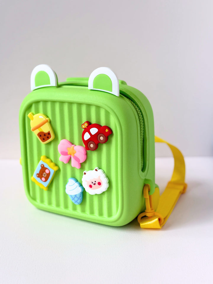 Green cute kids backpack with fun patches for ages 3 and up, perfect for school and outings