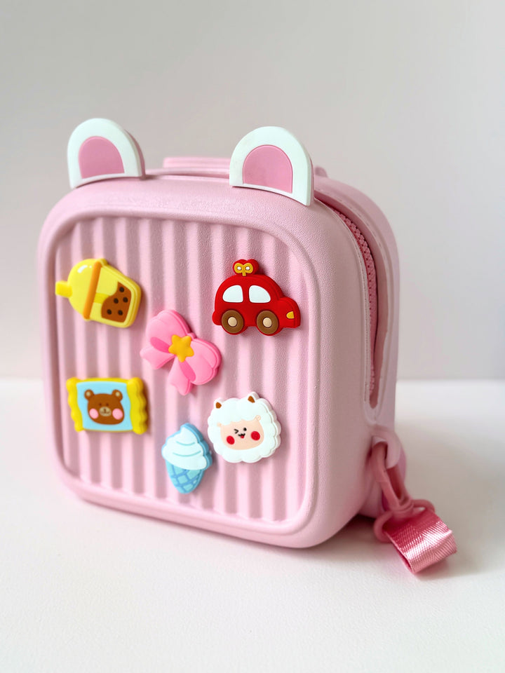 Cute kids backpack in pink with fun stickers and bear ears, perfect for ages 3 and up