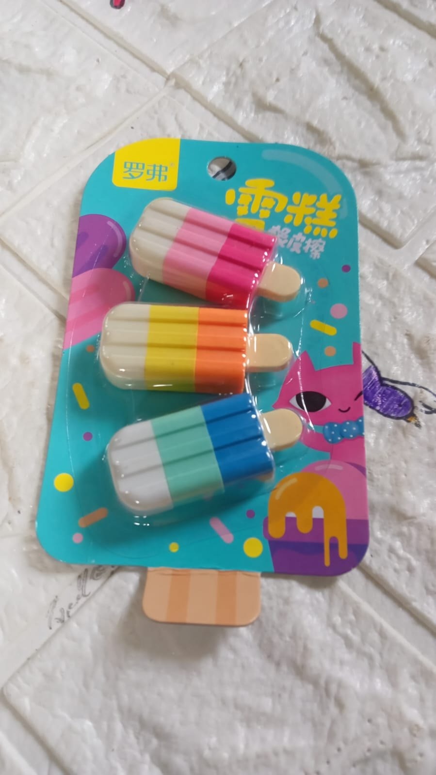 Colorful dessert eraser set for kids featuring popsicle designs, perfect for playful school supplies