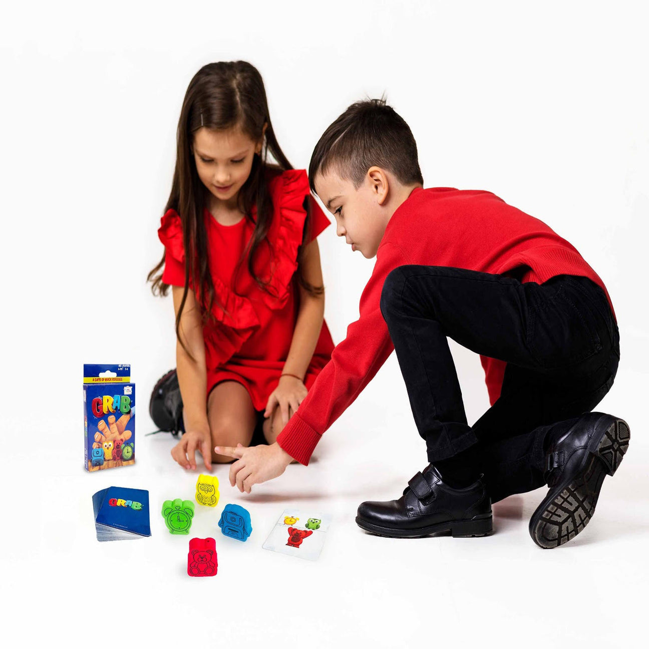 Family Feud the game with colorful cards and two kids playing, age 8+, great for family game night