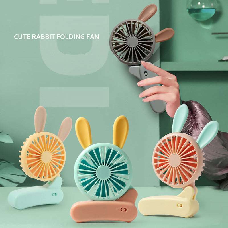 Cute rabbit handheld fan in pastel colors for kids age 3+, perfect for warm days and outdoor use