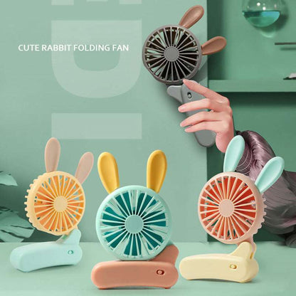 Cute rabbit handheld fan in pastel colors for kids age 3+, perfect for warm days and outdoor use